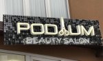 Живая вывеска для салона красоты Podium